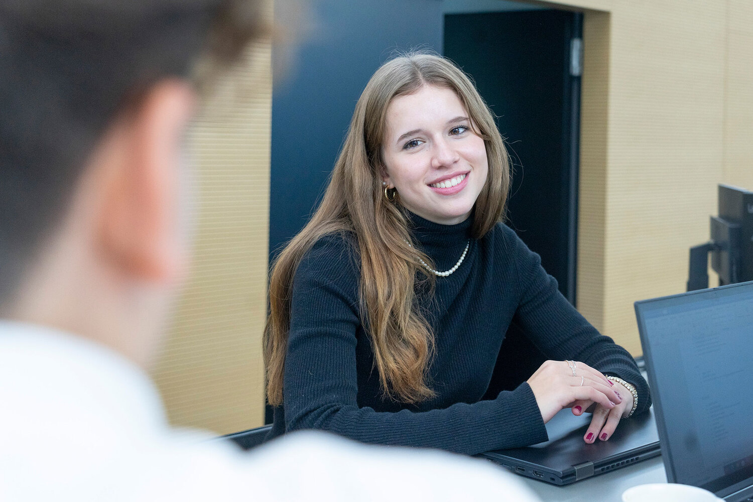 Apprentices during a talk at the workplace